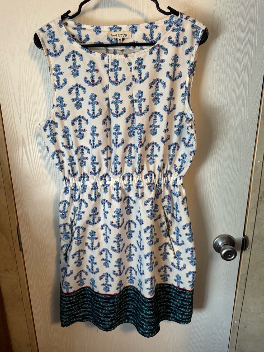 Speed Control White Mini Dress with Blue Floral Print and Red Centers